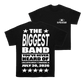 Two black short-sleeve T-shirts shown on a white background, with the front and back designs visible. The front shirt has large white text reading 'THE BIGGEST BAND YOU'VE NEVER HEARD OF' with stars and the date 'JULY 30, 2026,' and the back shirt has a small white '5 SECONDS OF SUMMER' logo on the left chest.
